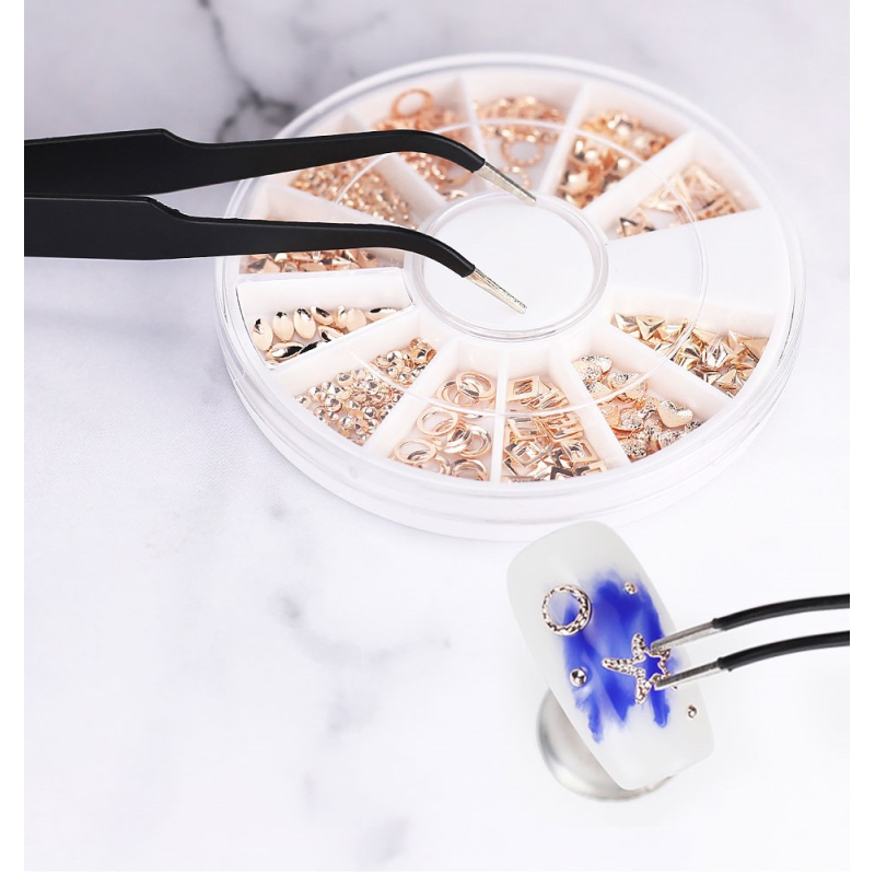 pince-a-strass-courbee onglerie motifs strass vernis permanents matérils onglerie